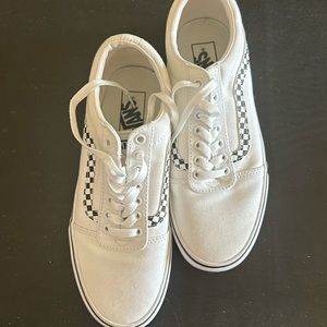 Brand new white and black checkered Old Skool vans.